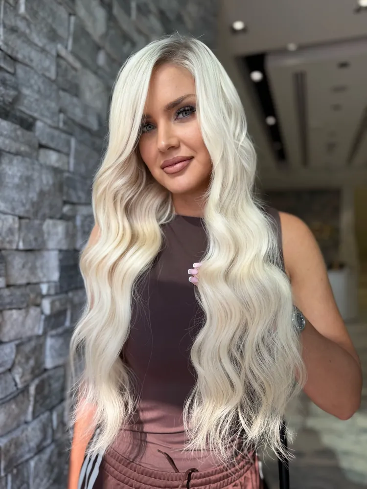 Platinum blonde with soft waves — FILTER Ladies Salon Abu Dhabi