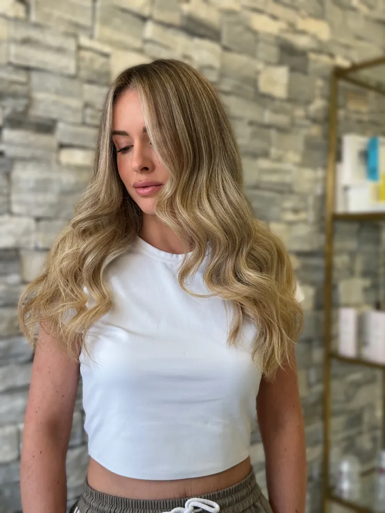Soft blonde waves — FILTER Ladies Salon Abu Dhabi
