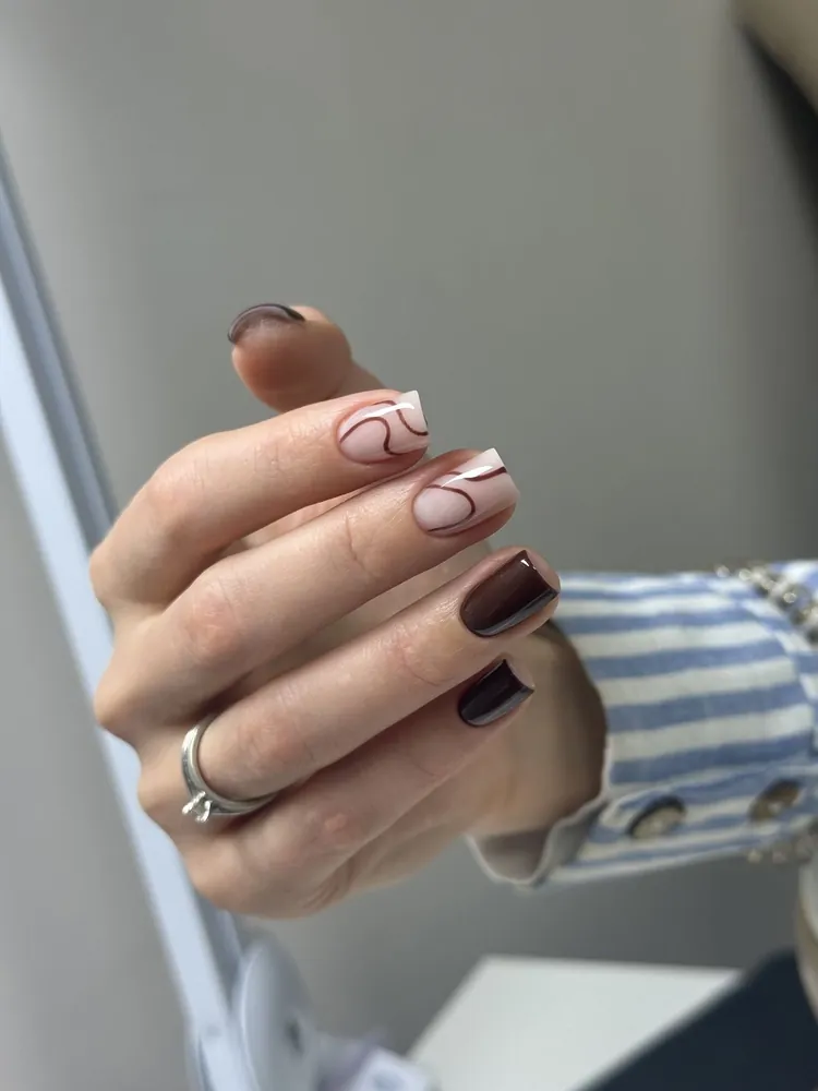 Burgundy abstract nail art — FILTER Ladies Salon Abu Dhabi